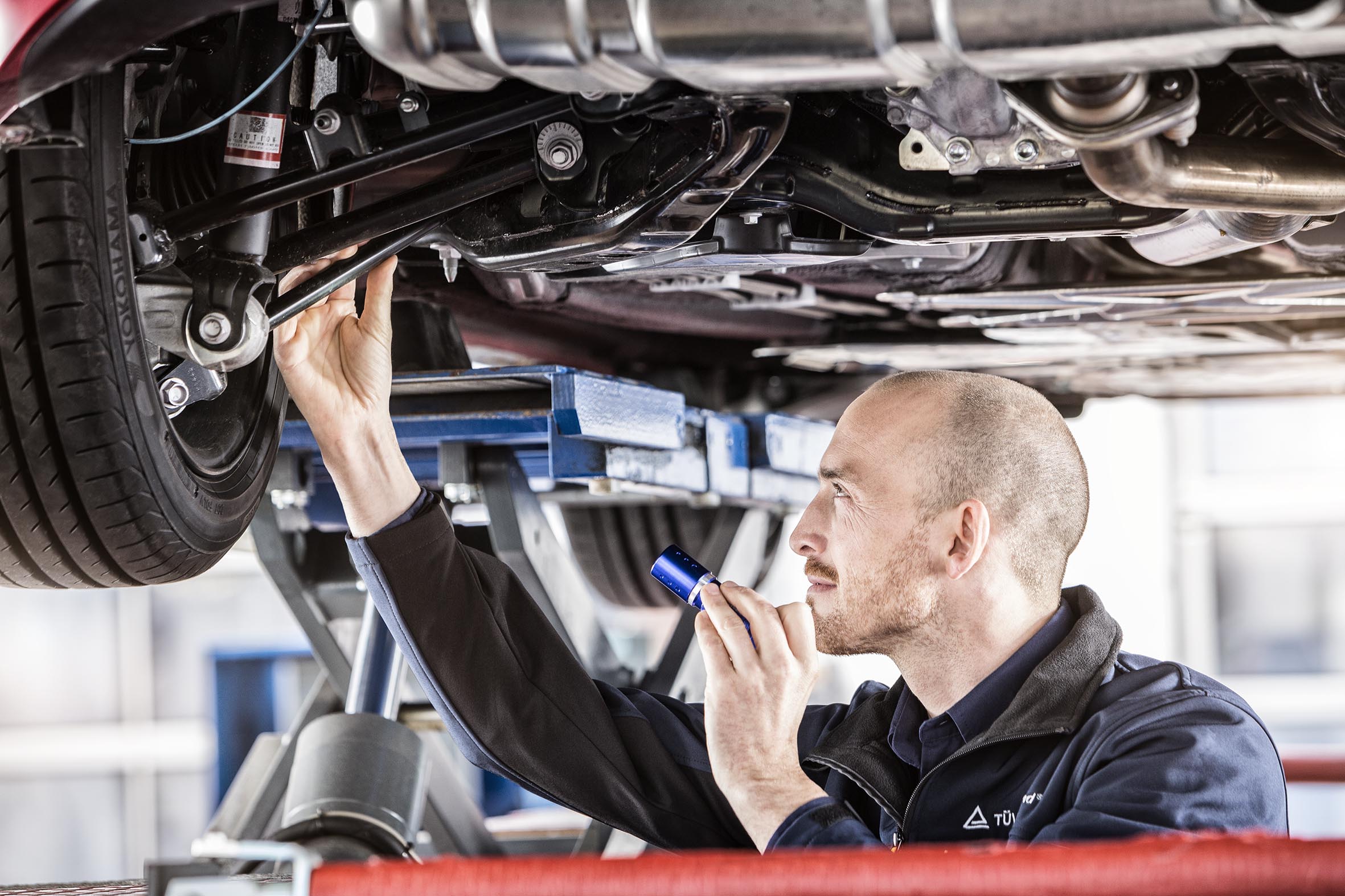 Auto repair shop performing detailed vehicle inspection at the start of the week