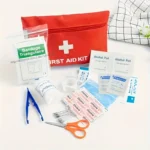 12 emergency first aid kits, including scissors, bandages, tape, and tweezers – compact red travel and car survival bag