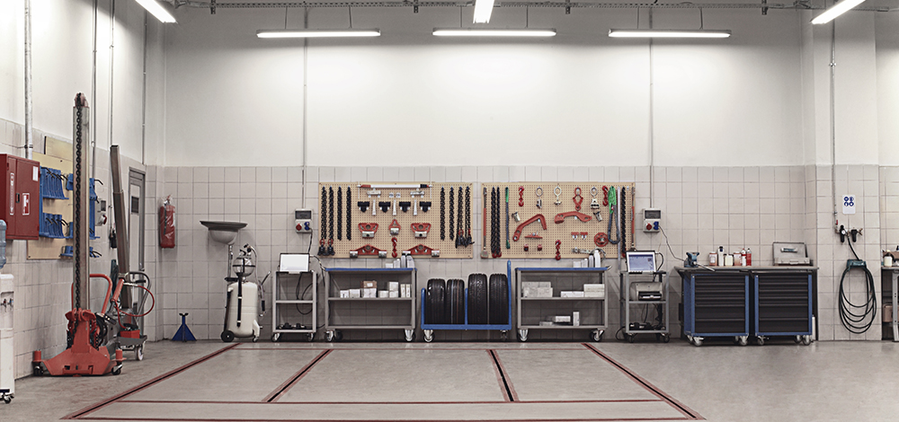 Clean and organized automotive repair shop environment that supports safety and efficiency